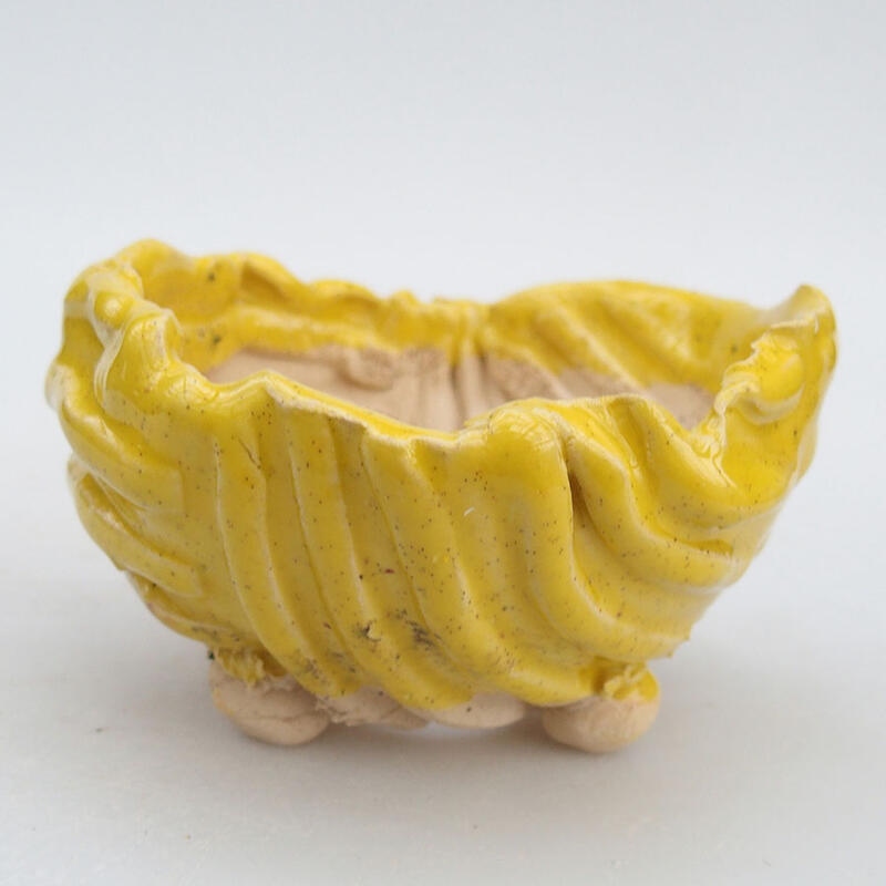 Coquille en céramique 9,5 x 9 x 6 cm , couleur jaune