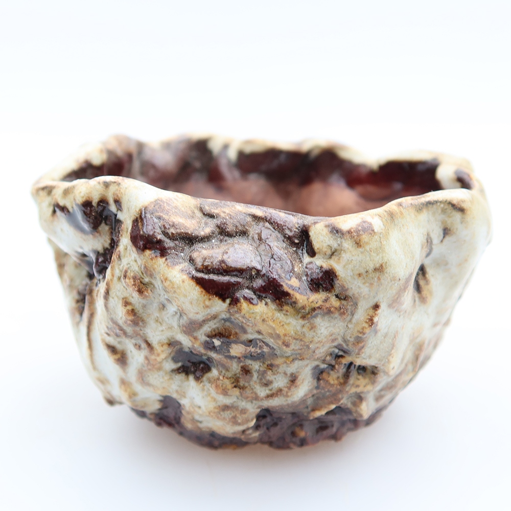 Coquille en céramique  7 x 7 x 5 cm, couleur brun-blanc